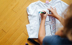 Use fabric dye or fabric markers