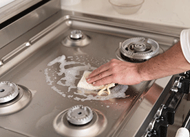  to Remove Burnt Grease From Stovetop