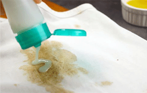 Using shampoo to remove cooking oil stains